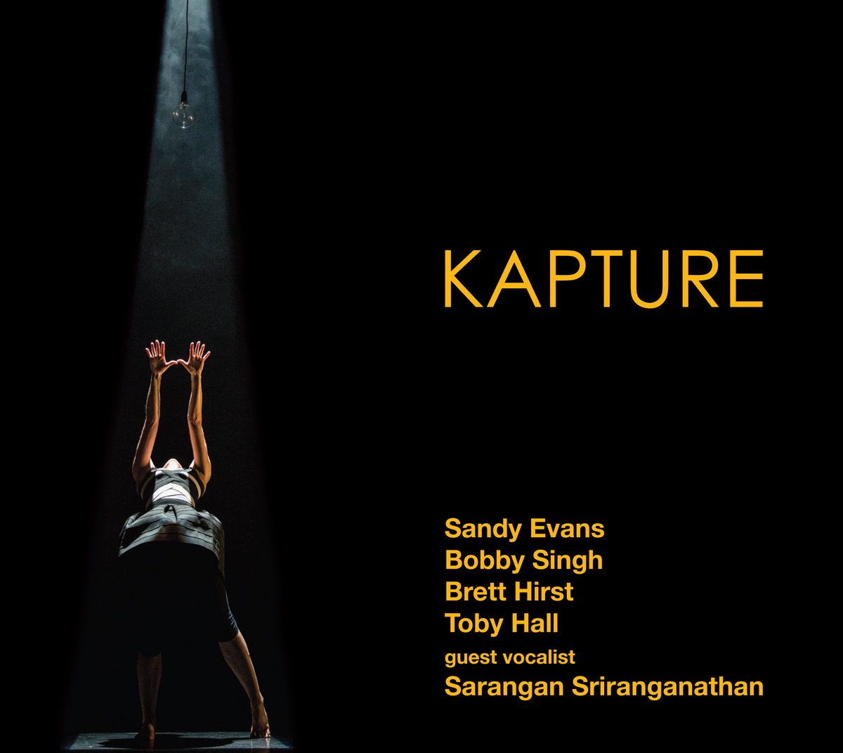 Kapture cover: a dancer in a beam of light on black, the title in gold