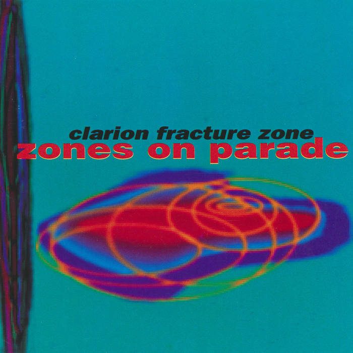 Zones on Parade cover: swirling red, purple and yellow rings on teal